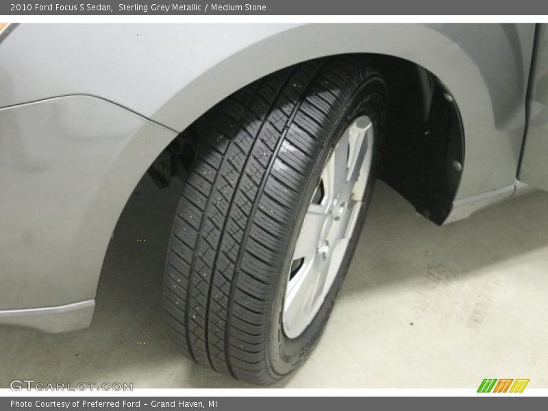Sterling Grey Metallic / Medium Stone 2010 Ford Focus S Sedan
