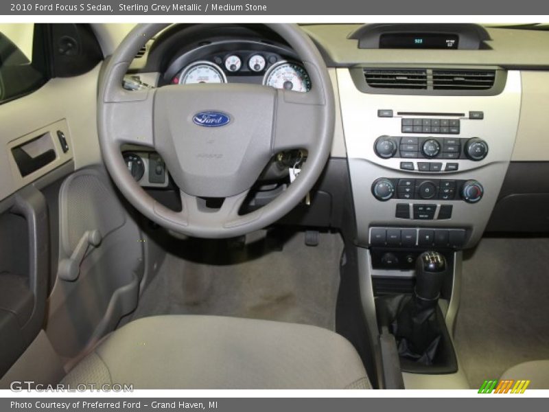 Sterling Grey Metallic / Medium Stone 2010 Ford Focus S Sedan