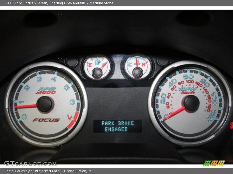 Sterling Grey Metallic / Medium Stone 2010 Ford Focus S Sedan