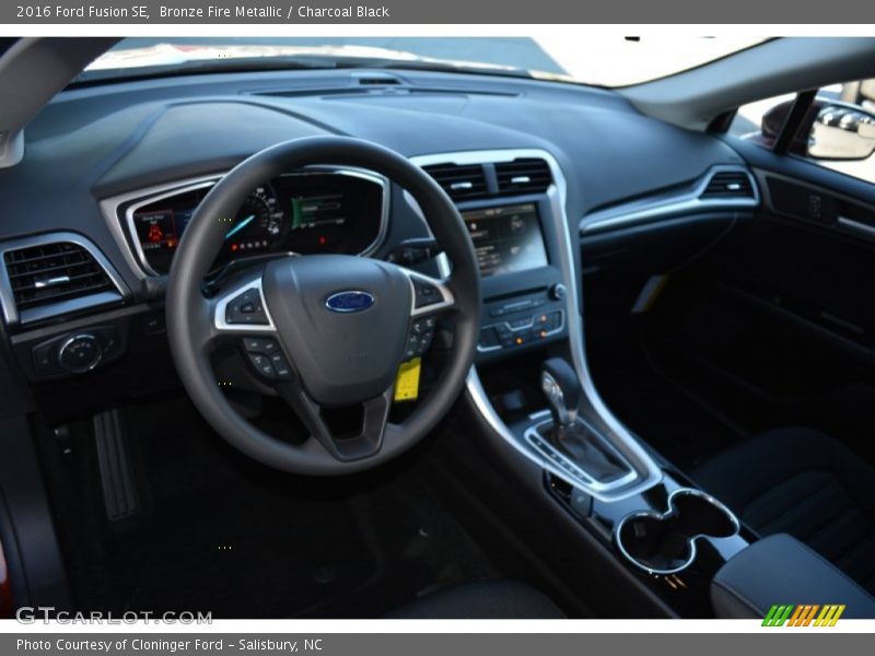 Bronze Fire Metallic / Charcoal Black 2016 Ford Fusion SE