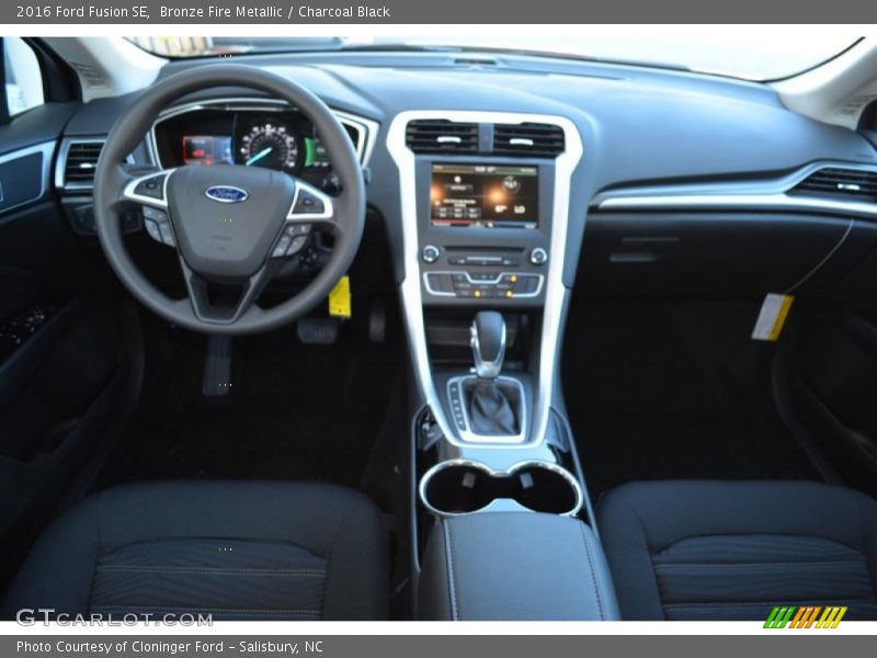 Bronze Fire Metallic / Charcoal Black 2016 Ford Fusion SE