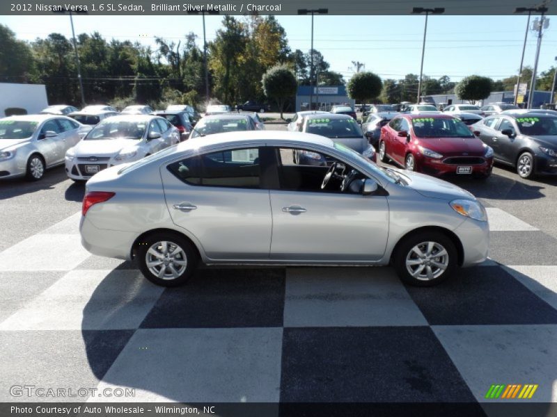 Brilliant Silver Metallic / Charcoal 2012 Nissan Versa 1.6 SL Sedan