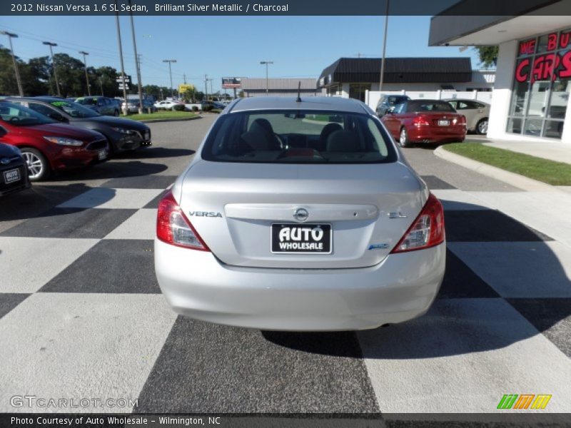 Brilliant Silver Metallic / Charcoal 2012 Nissan Versa 1.6 SL Sedan