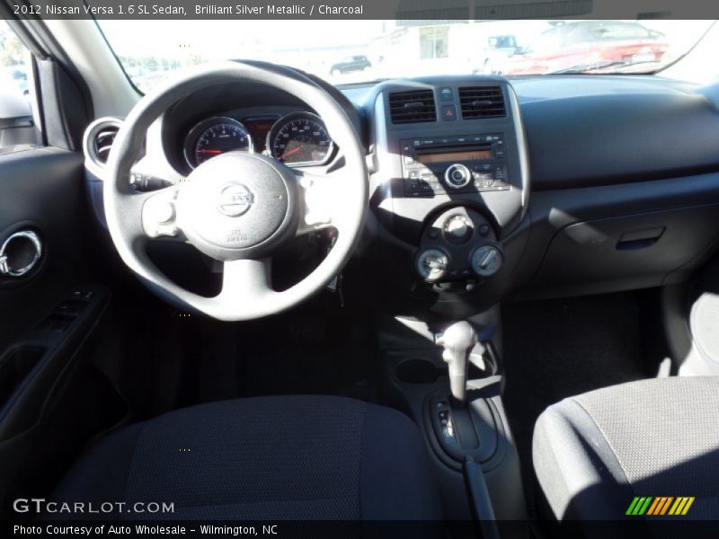 Brilliant Silver Metallic / Charcoal 2012 Nissan Versa 1.6 SL Sedan