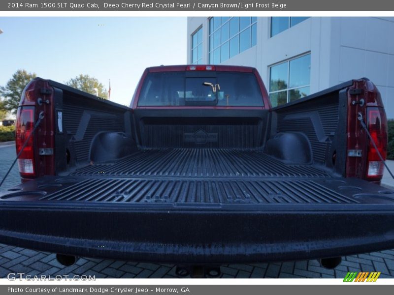 Deep Cherry Red Crystal Pearl / Canyon Brown/Light Frost Beige 2014 Ram 1500 SLT Quad Cab