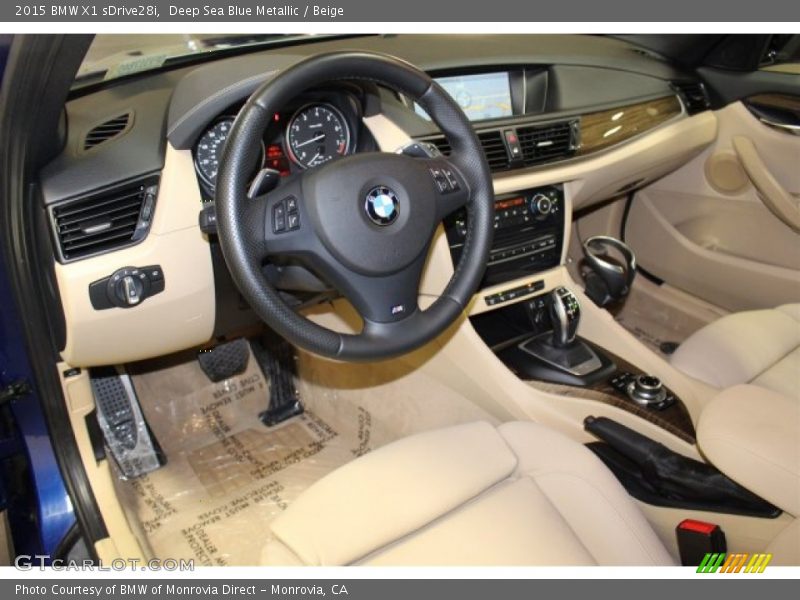 Deep Sea Blue Metallic / Beige 2015 BMW X1 sDrive28i