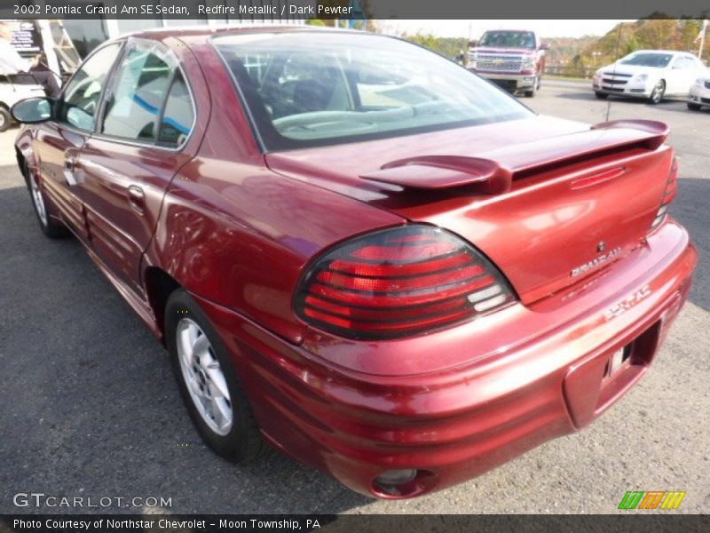 Redfire Metallic / Dark Pewter 2002 Pontiac Grand Am SE Sedan