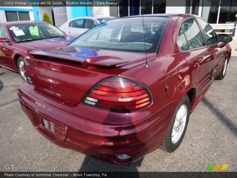 Redfire Metallic / Dark Pewter 2002 Pontiac Grand Am SE Sedan