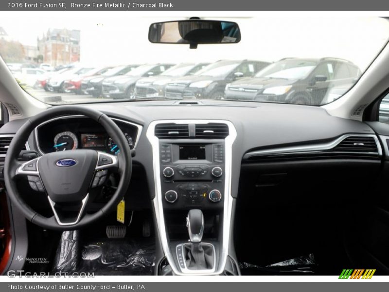 Bronze Fire Metallic / Charcoal Black 2016 Ford Fusion SE