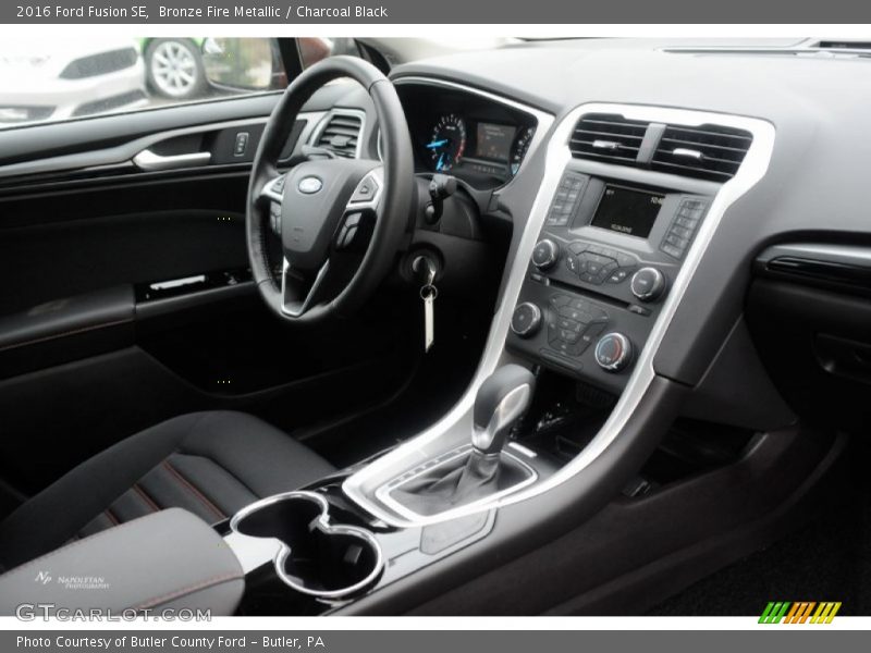 Bronze Fire Metallic / Charcoal Black 2016 Ford Fusion SE