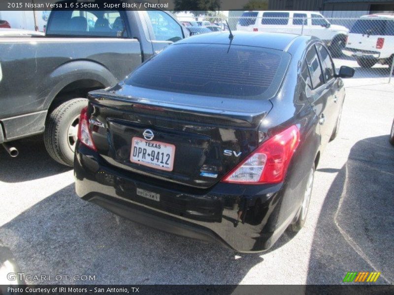 Super Black / Charcoal 2015 Nissan Versa 1.6 S Sedan