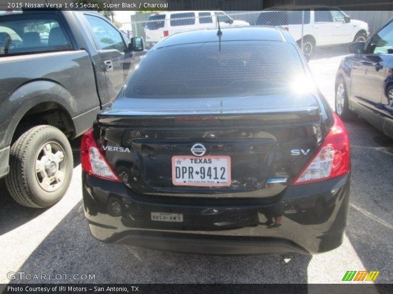 Super Black / Charcoal 2015 Nissan Versa 1.6 S Sedan