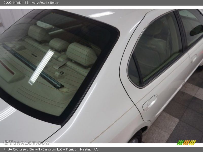 Ivory Pearl / Beige 2002 Infiniti I 35