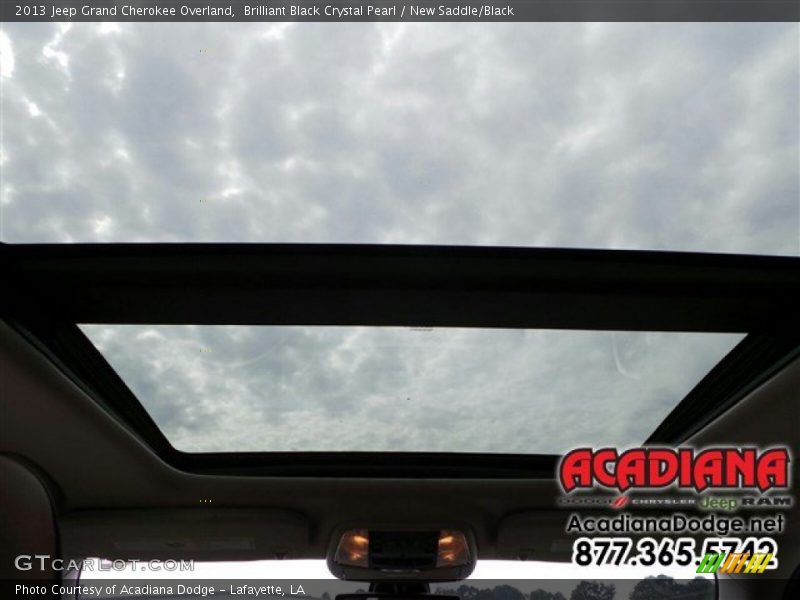 Brilliant Black Crystal Pearl / New Saddle/Black 2013 Jeep Grand Cherokee Overland