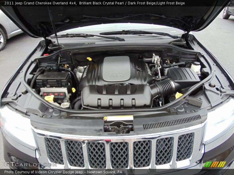 Brilliant Black Crystal Pearl / Dark Frost Beige/Light Frost Beige 2011 Jeep Grand Cherokee Overland 4x4