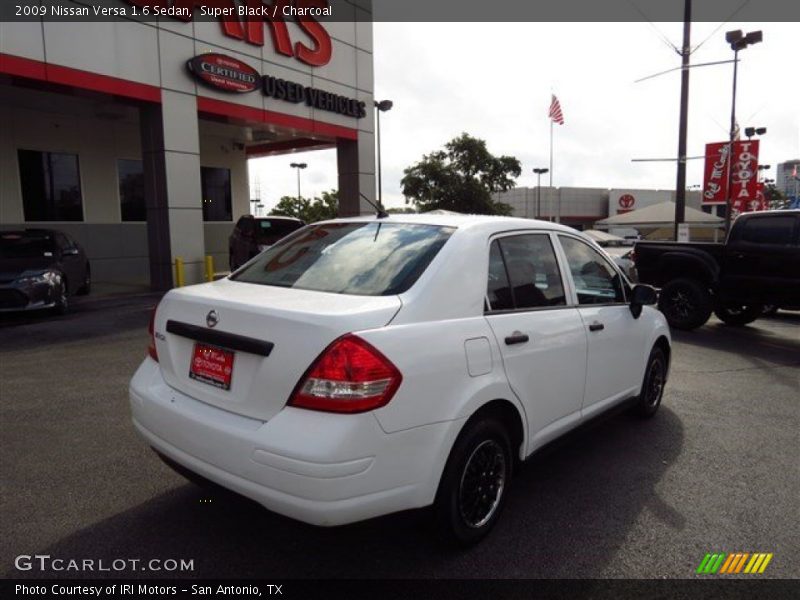 Super Black / Charcoal 2009 Nissan Versa 1.6 Sedan