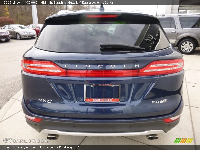 Midnight Sapphire Metallic / Espresso/White Sands 2015 Lincoln MKC AWD