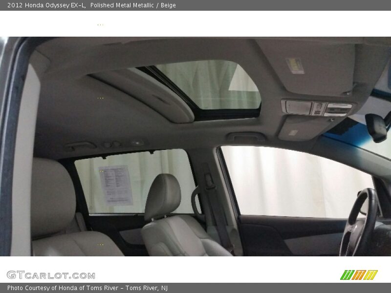 Polished Metal Metallic / Beige 2012 Honda Odyssey EX-L
