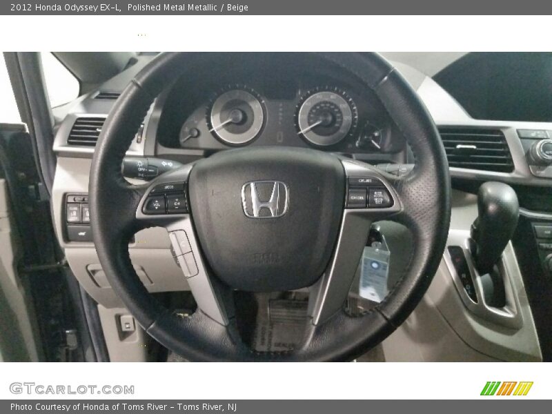 Polished Metal Metallic / Beige 2012 Honda Odyssey EX-L