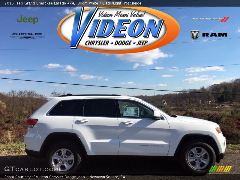 Bright White / Black/Light Frost Beige 2015 Jeep Grand Cherokee Laredo 4x4