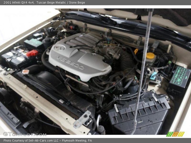 Tuscan Beige Metallic / Stone Beige 2001 Infiniti QX4 4x4