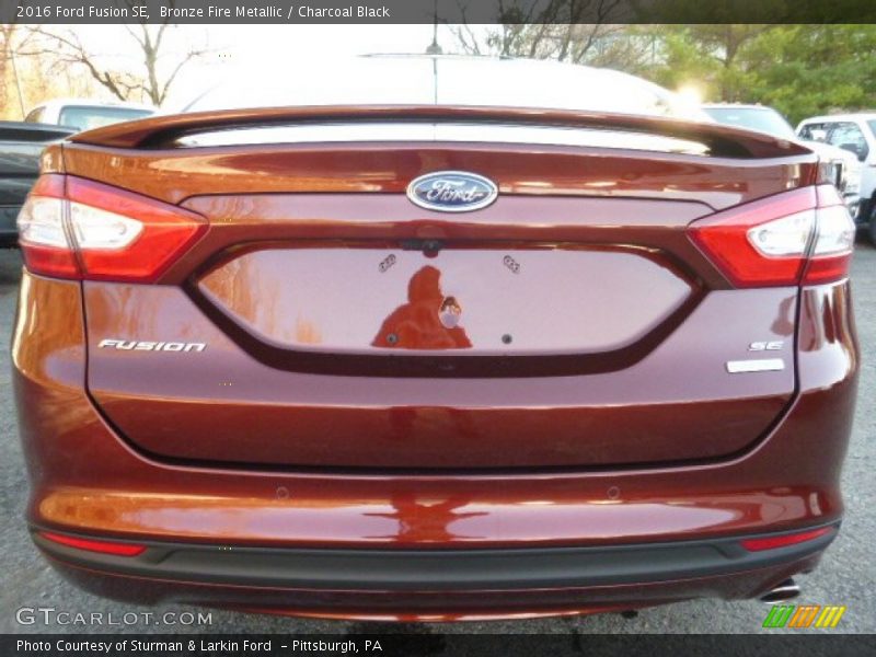 Bronze Fire Metallic / Charcoal Black 2016 Ford Fusion SE