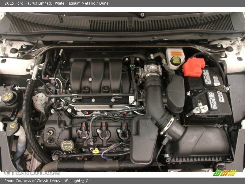 White Platinum Metallic / Dune 2015 Ford Taurus Limited