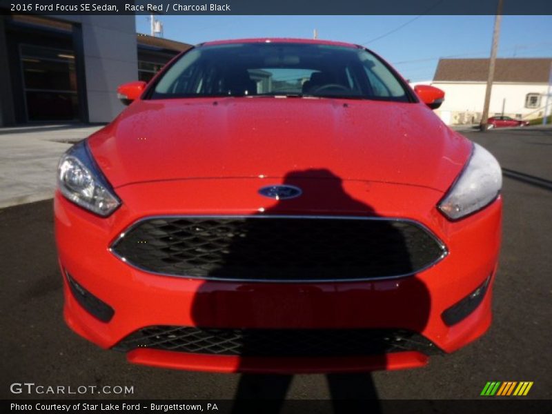 Race Red / Charcoal Black 2016 Ford Focus SE Sedan