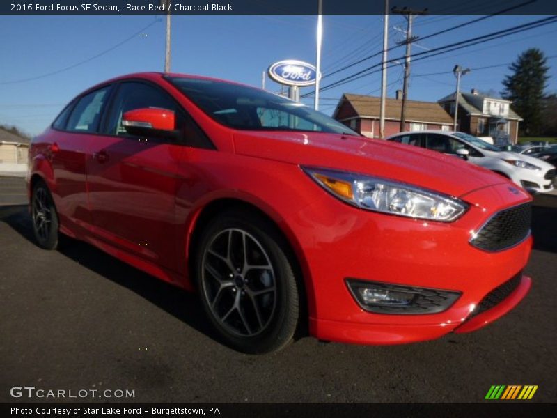 Race Red / Charcoal Black 2016 Ford Focus SE Sedan