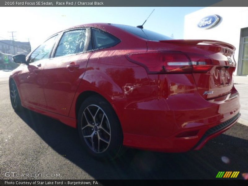 Race Red / Charcoal Black 2016 Ford Focus SE Sedan
