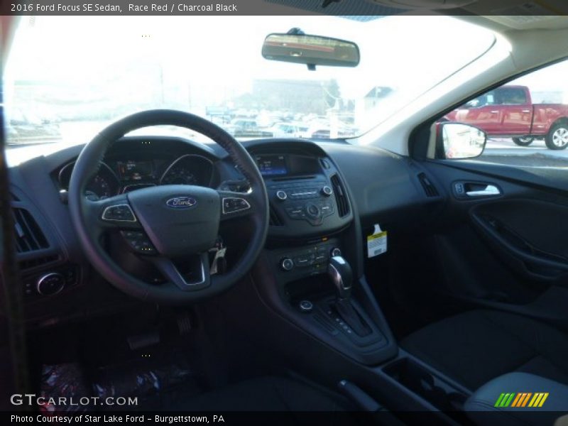 Race Red / Charcoal Black 2016 Ford Focus SE Sedan