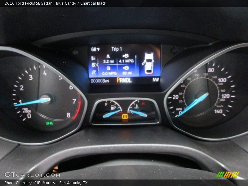 Blue Candy / Charcoal Black 2016 Ford Focus SE Sedan