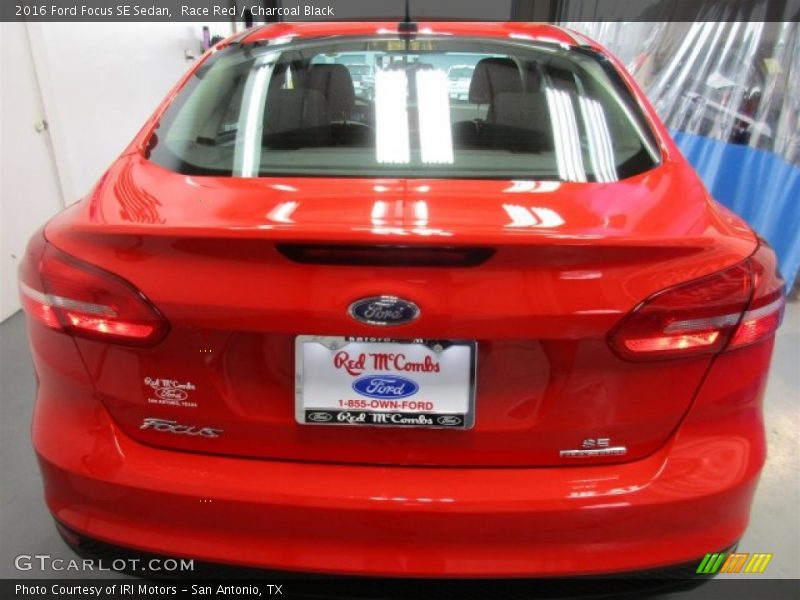 Race Red / Charcoal Black 2016 Ford Focus SE Sedan