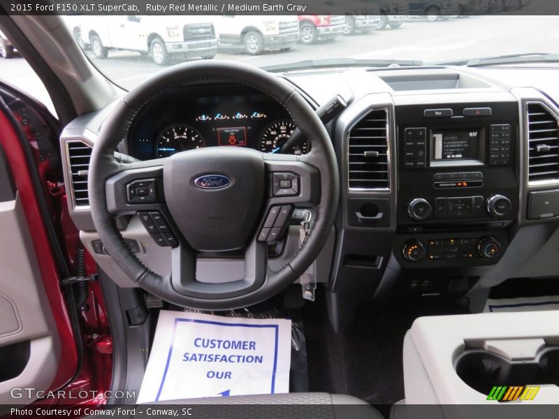 Ruby Red Metallic / Medium Earth Gray 2015 Ford F150 XLT SuperCab