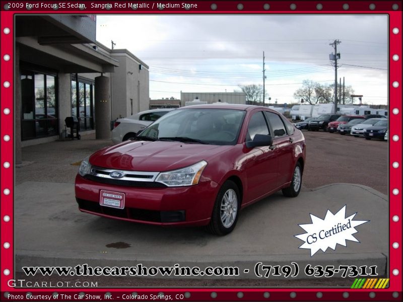 Sangria Red Metallic / Medium Stone 2009 Ford Focus SE Sedan