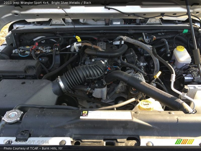 Bright Silver Metallic / Black 2011 Jeep Wrangler Sport 4x4