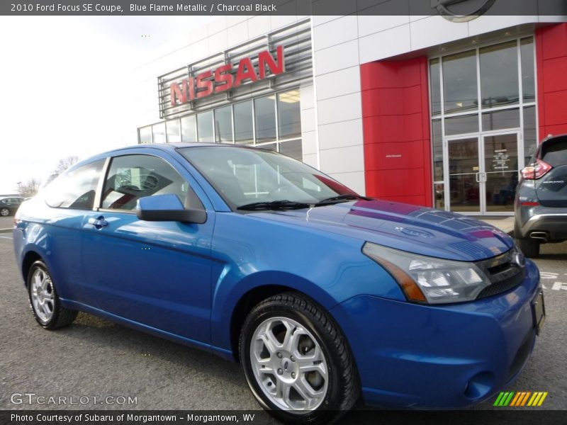 Blue Flame Metallic / Charcoal Black 2010 Ford Focus SE Coupe