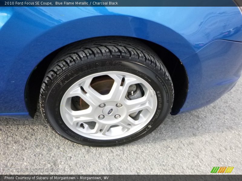 Blue Flame Metallic / Charcoal Black 2010 Ford Focus SE Coupe