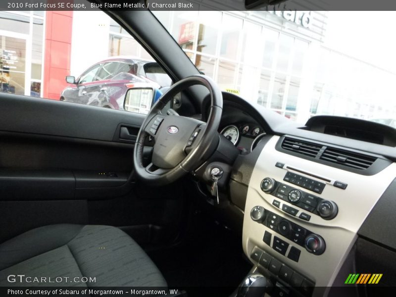 Blue Flame Metallic / Charcoal Black 2010 Ford Focus SE Coupe