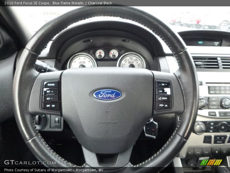 Blue Flame Metallic / Charcoal Black 2010 Ford Focus SE Coupe