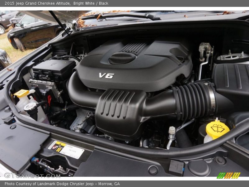 Bright White / Black 2015 Jeep Grand Cherokee Altitude