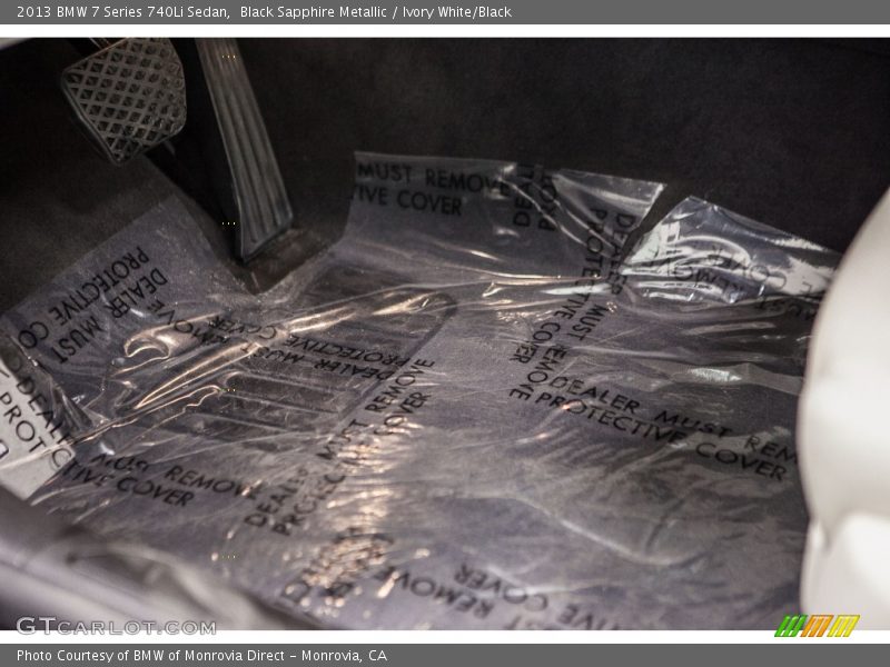 Black Sapphire Metallic / Ivory White/Black 2013 BMW 7 Series 740Li Sedan