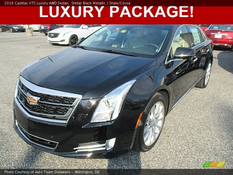 Stellar Black Metallic / Shale/Cocoa 2016 Cadillac XTS Luxury AWD Sedan
