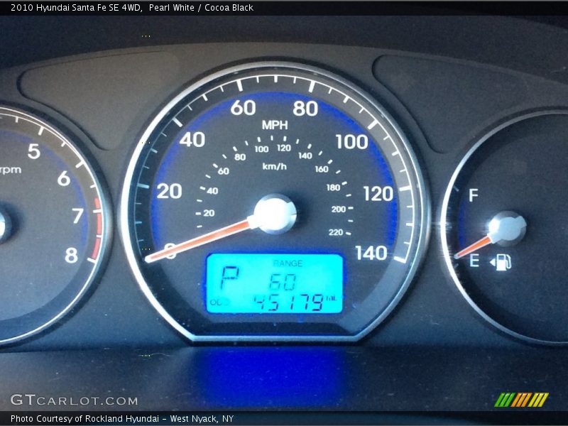 Pearl White / Cocoa Black 2010 Hyundai Santa Fe SE 4WD