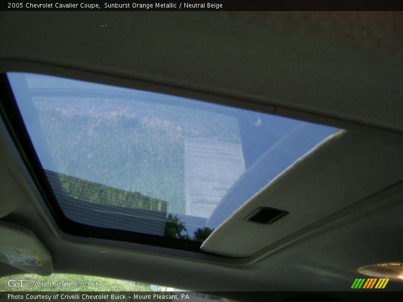 Sunburst Orange Metallic / Neutral Beige 2005 Chevrolet Cavalier Coupe