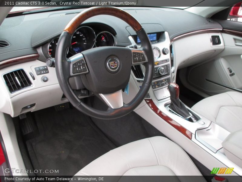 Crystal Red Tintcoat / Light Titanium/Ebony 2011 Cadillac CTS 3.0 Sedan