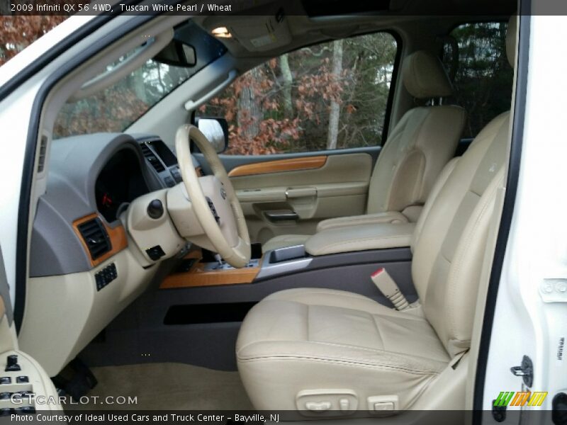 Tuscan White Pearl / Wheat 2009 Infiniti QX 56 4WD