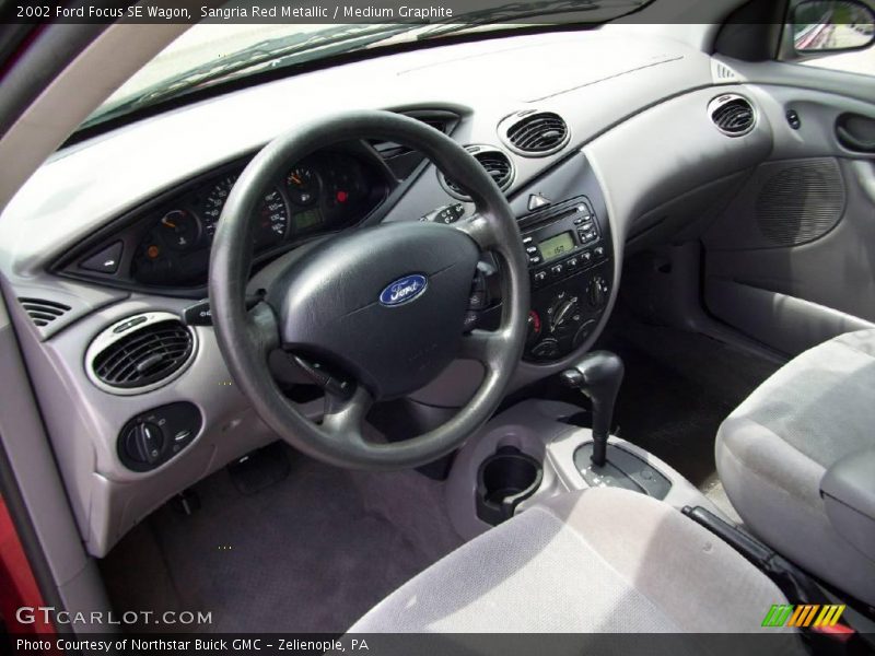 Sangria Red Metallic / Medium Graphite 2002 Ford Focus SE Wagon