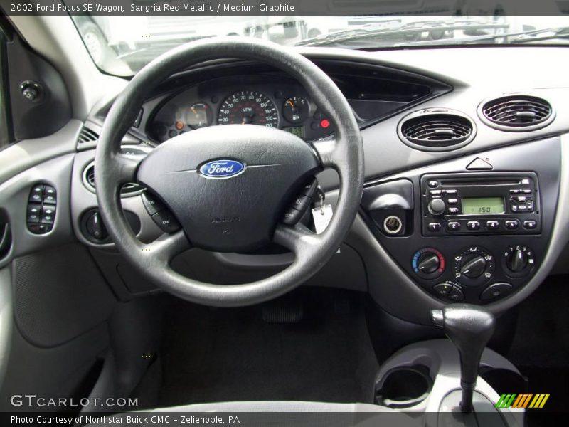 Sangria Red Metallic / Medium Graphite 2002 Ford Focus SE Wagon