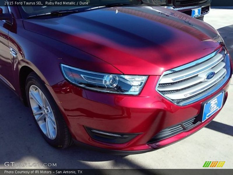Ruby Red Metallic / Dune 2015 Ford Taurus SEL